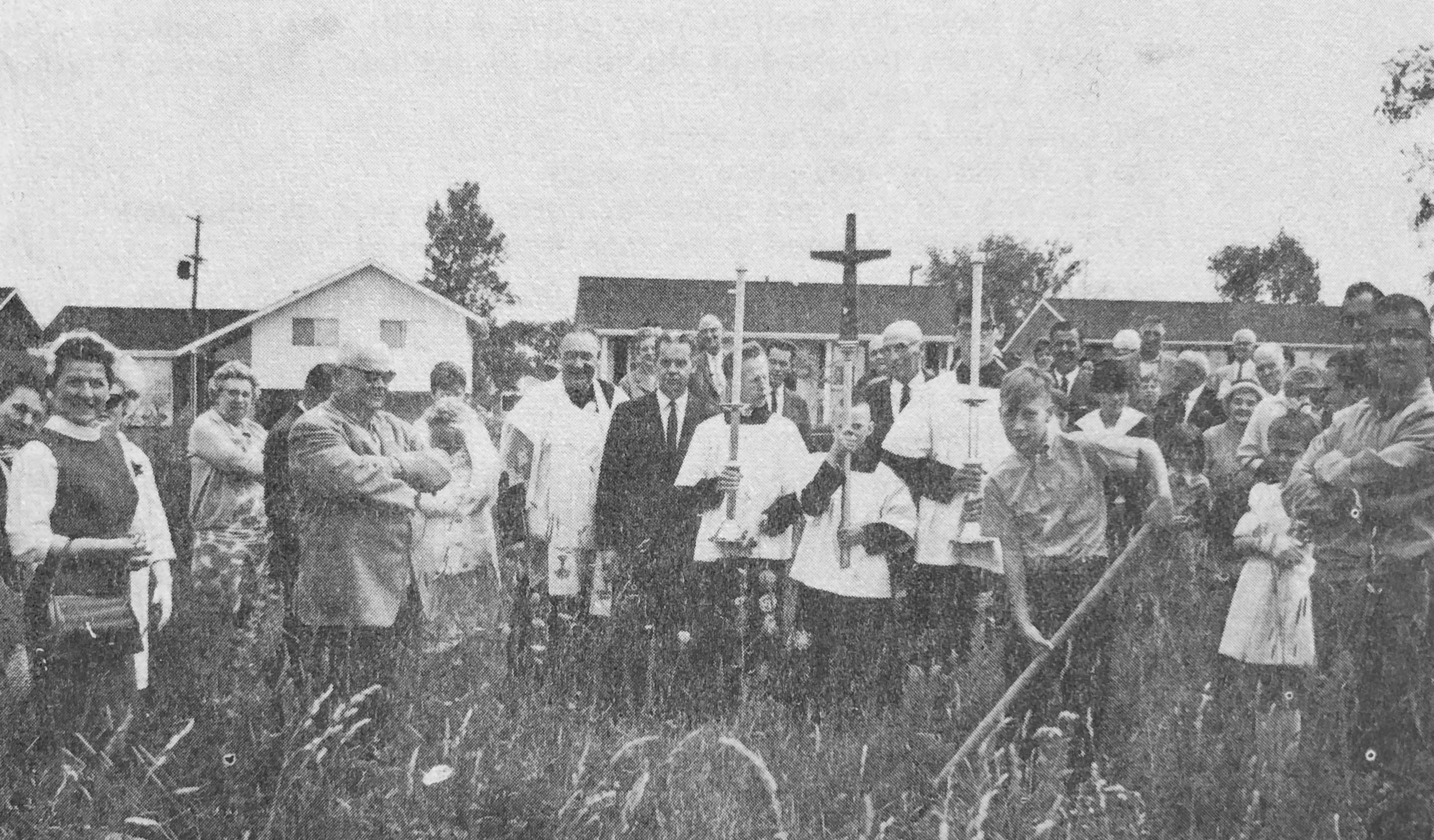 Photo of parishioners processing on grounds of St. Timothy pre-construction