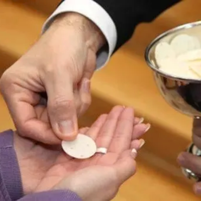 distributing holy communion