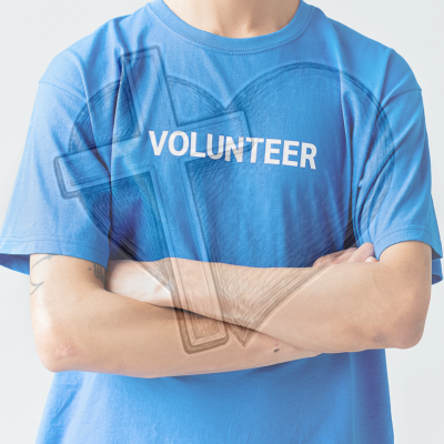 volunteer with cross and heart
